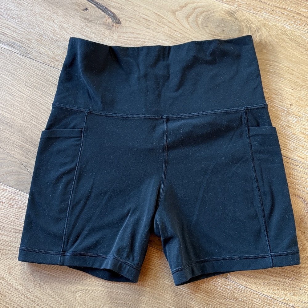 Athleta Black Salutation Stash 5 Pocket Bike Shorts